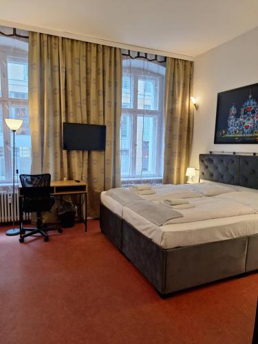 Postel nebo postele na pokoji v ubytování Hotel Amelie Berlin