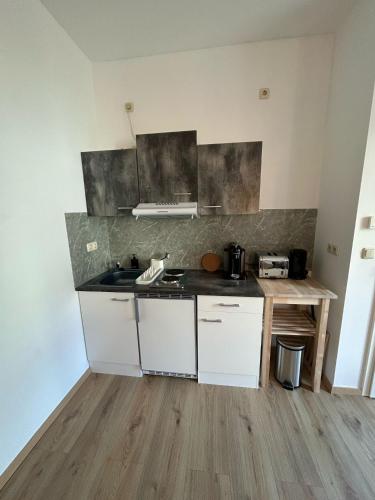 Una cocina o cocineta en RoCo Appartment