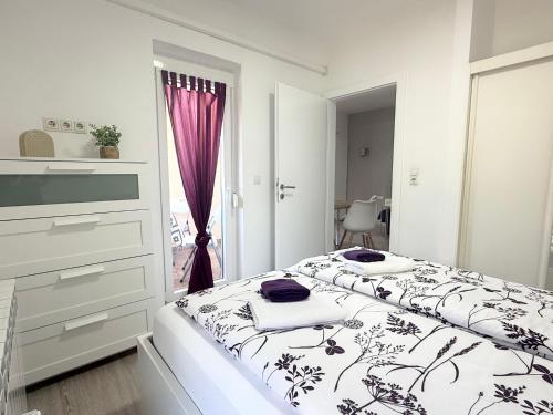 Katil atau katil-katil dalam bilik di Apartments Antic