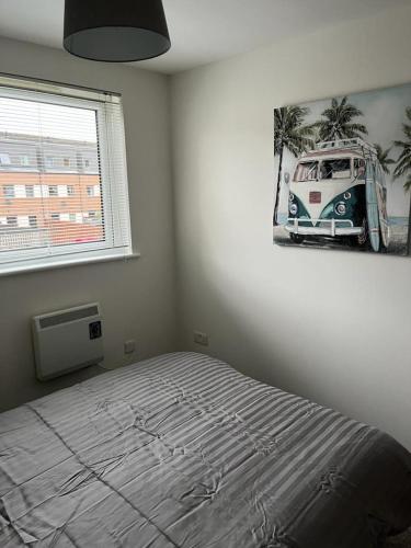 Ένα ή περισσότερα κρεβάτια σε δωμάτιο στο Ferry Gait Apartments