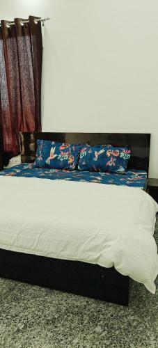 Ένα ή περισσότερα κρεβάτια σε δωμάτιο στο Hotel Golden Palace