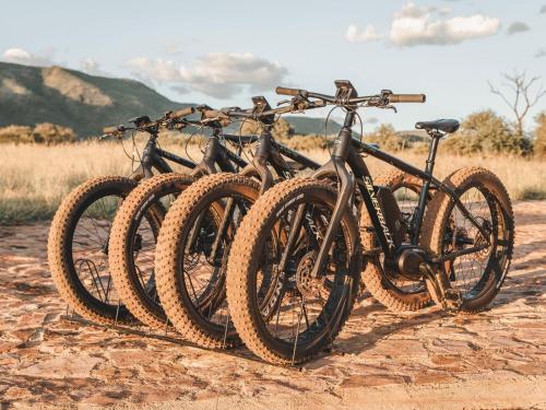 two bikes parked next to each other on a dirt road at Thaba eNtle Private Boutique Game Farm in Thabazimbi