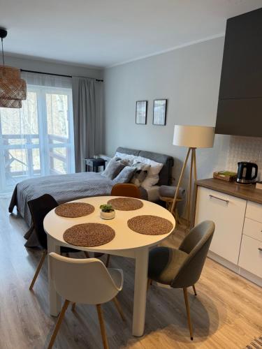 Posezení v ubytování Piękne miejsca przy deptaku Mountain Aparts