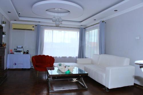 Zona de estar de Suprime Hotels and Conference