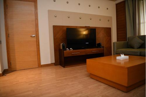 TV a/nebo společenská místnost v ubytování Coral Sea Imperial "Coral Sea Sensatori"