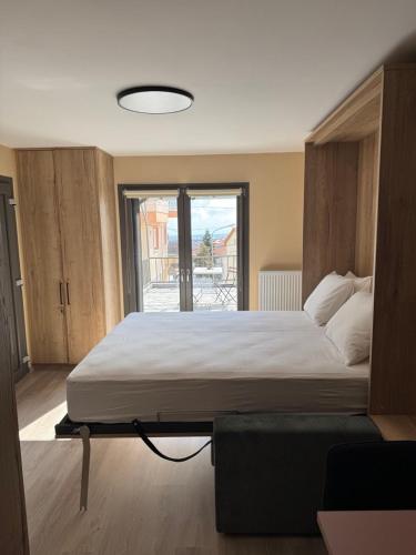 Postel nebo postele na pokoji v ubytování Manoria studio