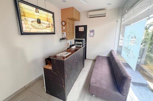 a room with a counter and a couch in it at The Byke Express - Avanti Residency - Ujjain in Ujjain