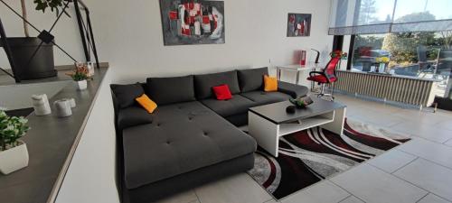 Χώρος καθιστικού στο Moderne Doppelhaushälfte mit Süd-West-Terrasse