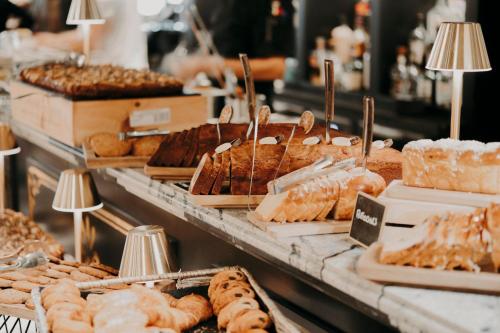 a bakery with many different types of pastries on display at Château Capitoul in Narbonne