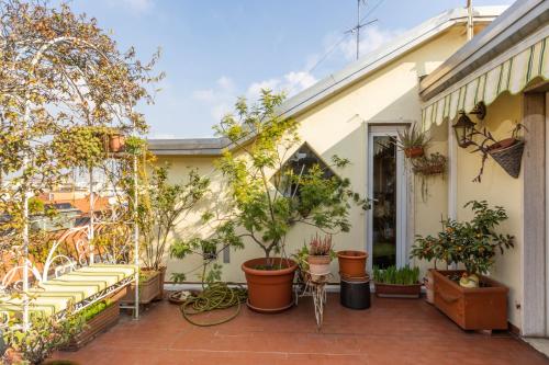 Hostmate - Milano - Design anni 50 terrazza botanica