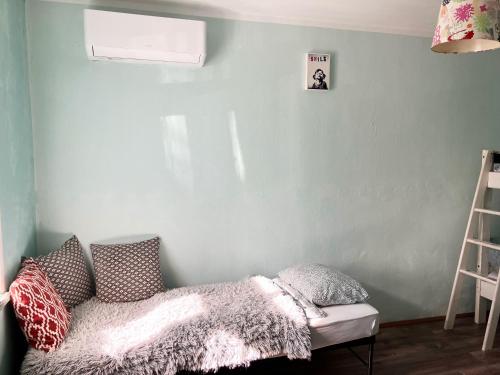 Julesence apartman Lesencetomajにあるベッド