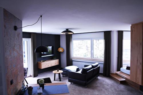 Postel nebo postele na pokoji v ubytování Boutique-Hotel im Weingarten