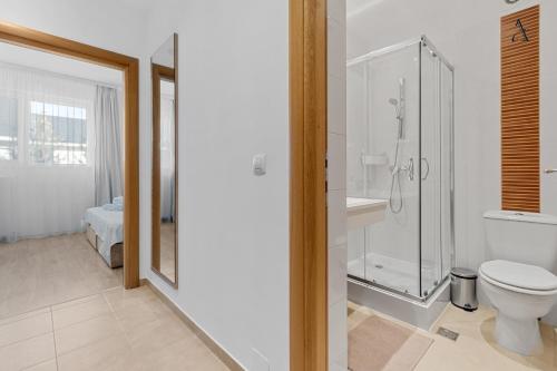 Ένα μπάνιο στο Apartment in RIN Otopeni