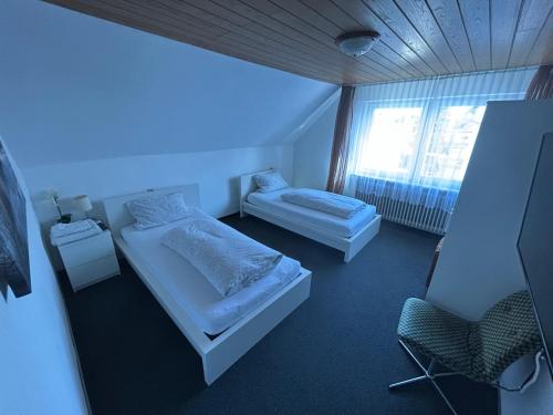 Ένα ή περισσότερα κρεβάτια σε δωμάτιο στο Central Apartment Rödermark 3SZ