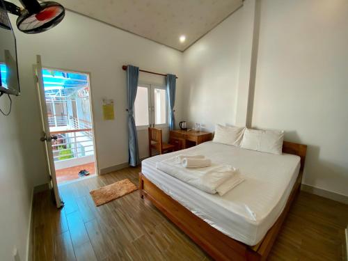 Katil atau katil-katil dalam bilik di ღ Orchid Guesthouse ღ 5 minutes to the Beach & Night Market ღ
