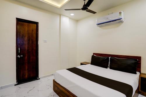 Ένα ή περισσότερα κρεβάτια σε δωμάτιο στο Hotel O highway blues