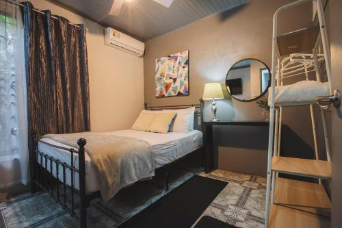 Voodi või voodid majutusasutuse Villa Diriá La Fortuna - Downtown Home toas