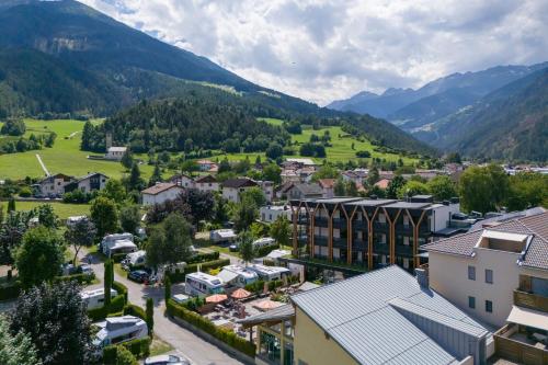 an aerial view of a small town in the mountains at Residence Sägemühle in Prato allo Stelvio