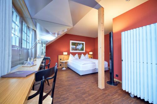 Postel nebo postele na pokoji v ubytování Hotel Arenenberg