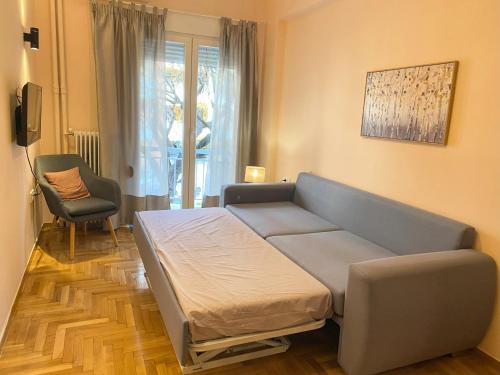 Ένα ή περισσότερα κρεβάτια σε δωμάτιο στο allegro alsos apartment