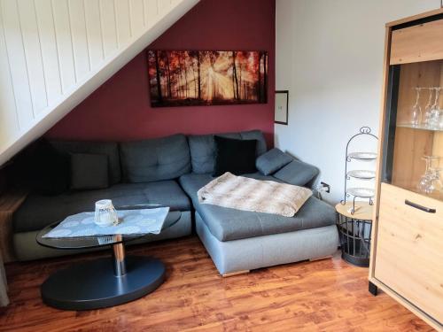 Posezení v ubytování Ferienwohnung an der Bieke
