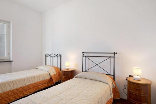 Ένα ή περισσότερα κρεβάτια σε δωμάτιο στο Villa Lucia