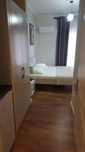 Postel nebo postele na pokoji v ubytování Hotel Klironomi