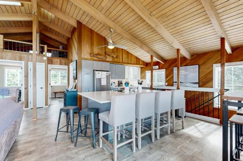 a kitchen and dining room with a table and chairs at The Sand Ranch in Rockaway Beach