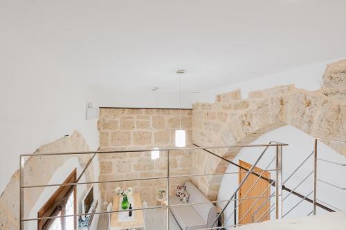 a view of the inside of a museum with a stone building at Casa Velella in Castellammare del Golfo