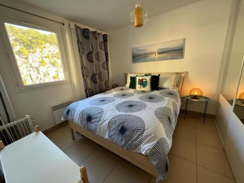 Ένα ή περισσότερα κρεβάτια σε δωμάτιο στο Somptueux T3 vue unique, pisicne