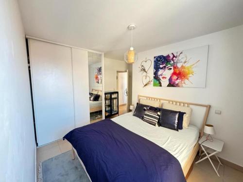 Ένα ή περισσότερα κρεβάτια σε δωμάτιο στο Somptueux T3 vue unique, pisicne