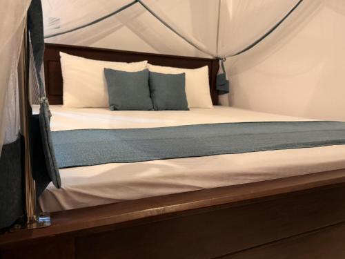 a bedroom with a bed in a tent at Sea Bay Inn Tangalle in Tangalle
