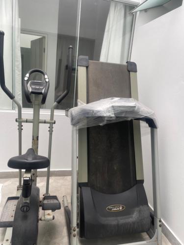 a hospital room with a bed and a chair at Hermosa casa de playa Asia in Lima