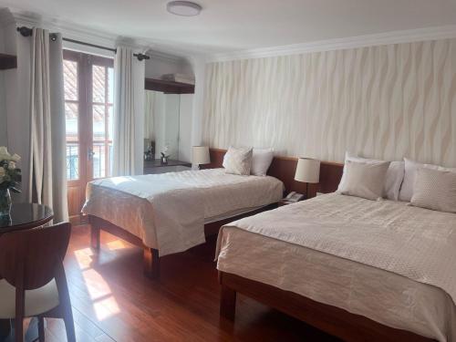 Postel nebo postele na pokoji v ubytování VIRREYES HOTEL