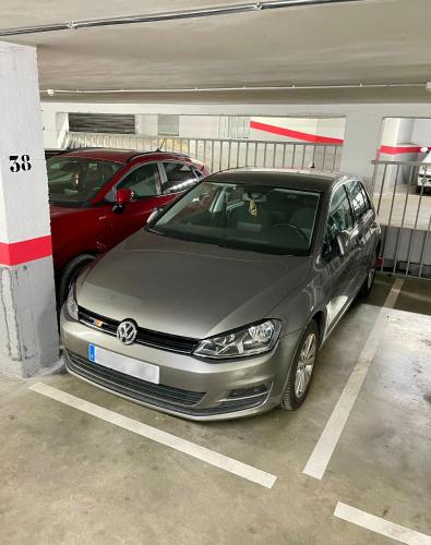 a silver car parked in a parking garage at Apartamento "La Bodega" by Clabao in Logroño