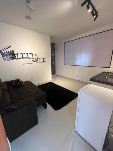 Η κουζίνα ή μικρή κουζίνα στο Cinema · Luz, Câmera, Flat Temático Cinema C/ar