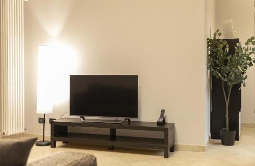 TV a/nebo společenská místnost v ubytování Appartamento Palazzo dei Duchi 1