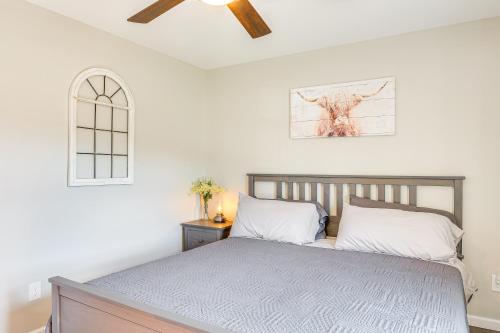 a bedroom with a bed and a ceiling fan at Near State Parks and Dtwn Quaint Sparta Home! in Sparta