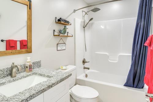 a bathroom with a sink and a toilet and a shower at Near State Parks and Dtwn Quaint Sparta Home! in Sparta