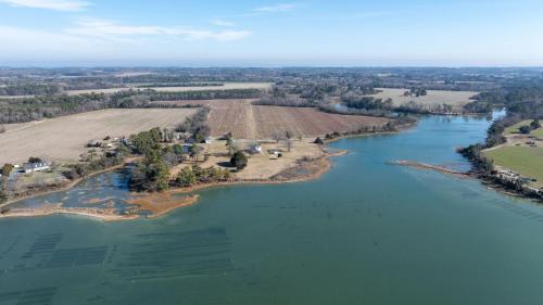 an island in the middle of a river at Huntington Farm - Pristine Historical Home Overlooking Cherrystone Creek! in Cape Charles