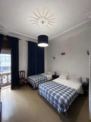 Ένα ή περισσότερα κρεβάτια σε δωμάτιο στο Monte Sinai Guest House