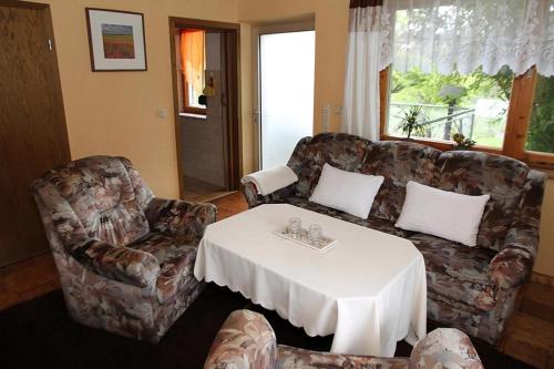 Χώρος καθιστικού στο Ferienhaus Am Weiher