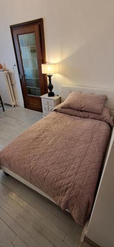 Postel nebo postele na pokoji v ubytování Contrex thermes