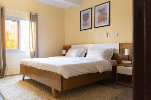 Postel nebo postele na pokoji v ubytování High-end 2BR apartment in the heart of Yaoundé