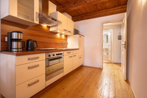 Η κουζίνα ή μικρή κουζίνα στο Apartments Altstadthaus Görlitz