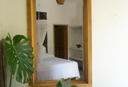 Ένα ή περισσότερα κρεβάτια σε δωμάτιο στο Casa Lucy Oaxaca
