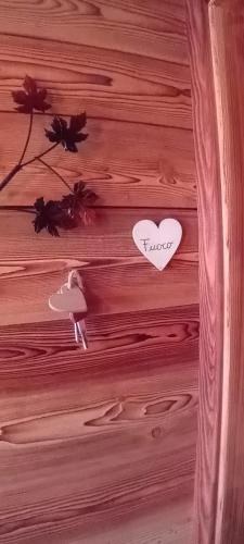 a wooden drawer with a paper heart on it at Maso Luch in Monclassico