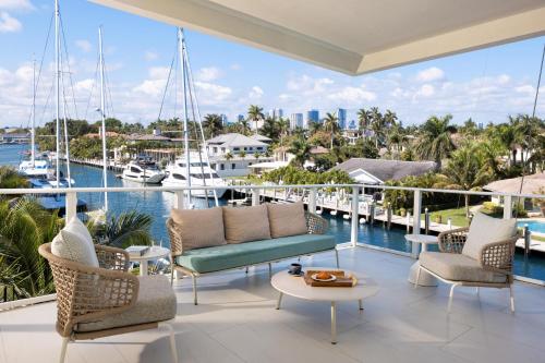 a balcony with a view of the water and boats at Pier Sixty-Six in Fort Lauderdale