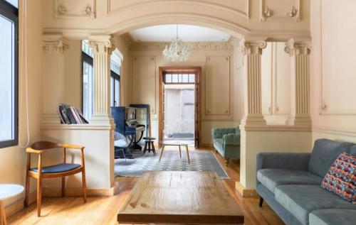 a living room with a couch and a table at Fernández Leal 55 in Mexico City