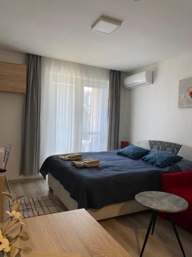 Postel nebo postele na pokoji v ubytování Apartmán Podhájska